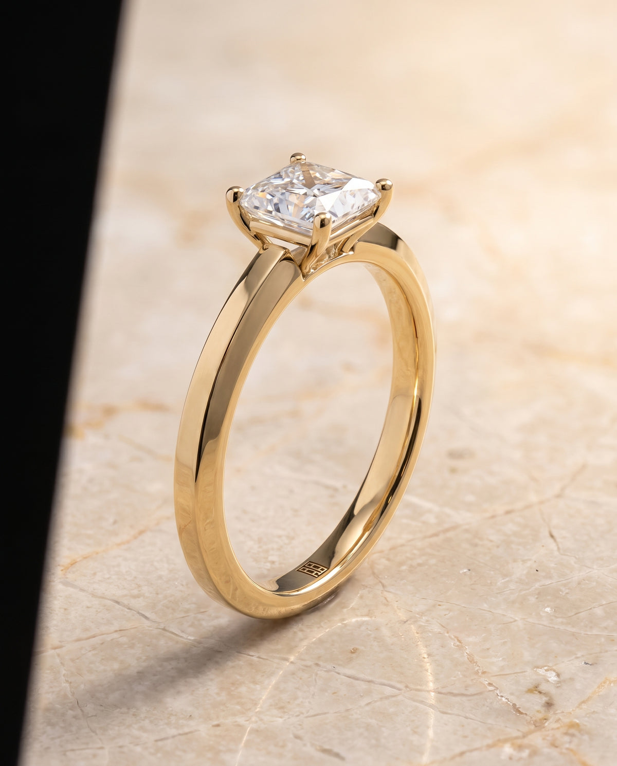 The Carmen Beveled Edge Comfort Fit Solitaire Princess Cut Engagement Ring Setting in 18K Yellow Gold
