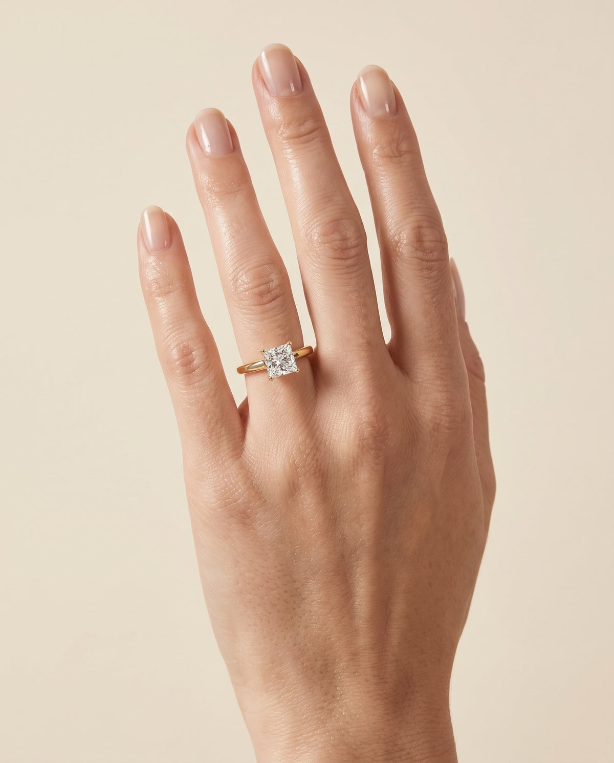 The Carmen Beveled Edge Comfort Fit Solitaire Princess Cut Engagement Ring Setting in 18K Yellow Gold