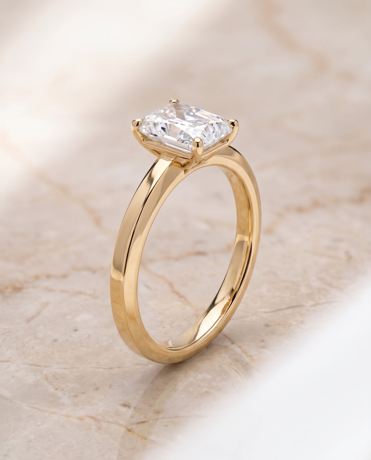The Carmen Beveled Edge Comfort Fit Solitaire Radiant Cut Engagement Ring Setting in 18K Yellow Gold