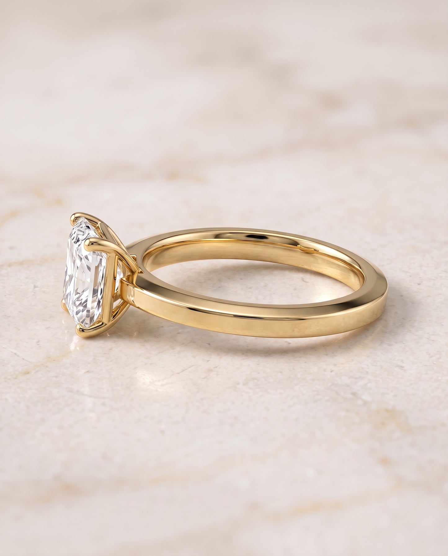 The Carmen Beveled Edge Comfort Fit Solitaire Radiant Cut Engagement Ring Setting in 18K Yellow Gold