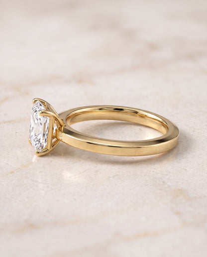 The Carmen Beveled Edge Comfort Fit Solitaire Radiant Cut Engagement Ring Setting in 18K Yellow Gold
