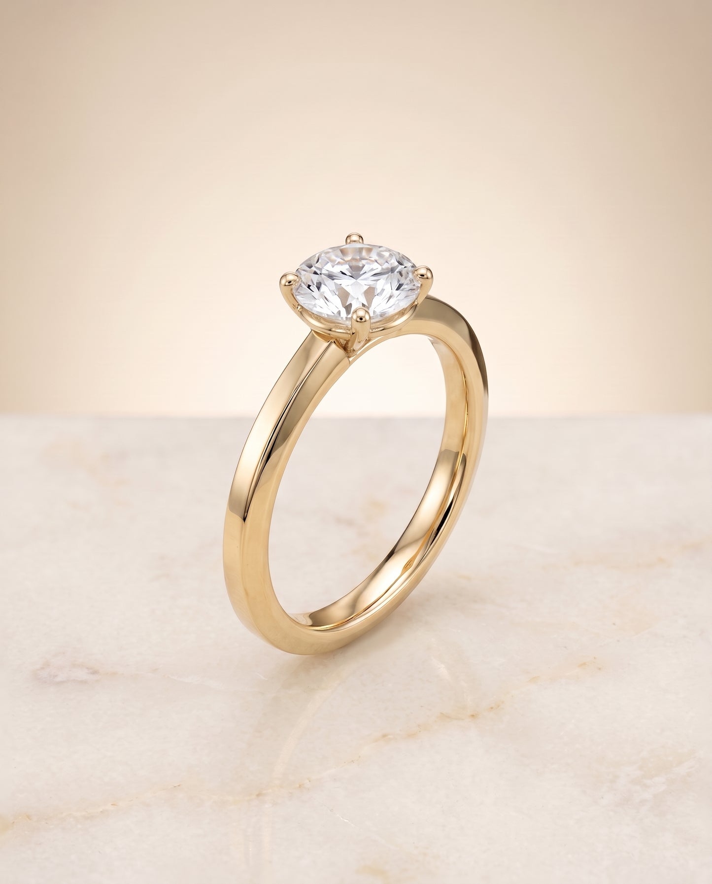 The Carmen Beveled Edge Comfort Fit Solitaire Round Engagement Ring Setting in 18K Yellow Gold