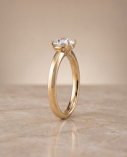 The Carmen Beveled Edge Comfort Fit Solitaire Round Engagement Ring Setting in 18K Yellow Gold