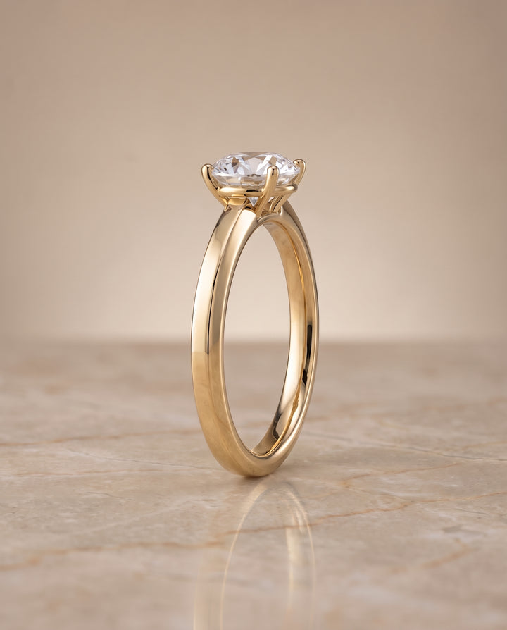 The Carmen Beveled Edge Comfort Fit Solitaire Round Engagement Ring Setting in 18K Yellow Gold