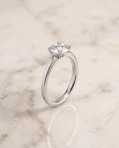 The Carmen Beveled Edge Comfort Fit Solitaire Round Engagement Ring Setting in Platinum