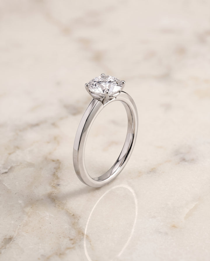 The Carmen Beveled Edge Comfort Fit Solitaire Round Engagement Ring Setting in Platinum