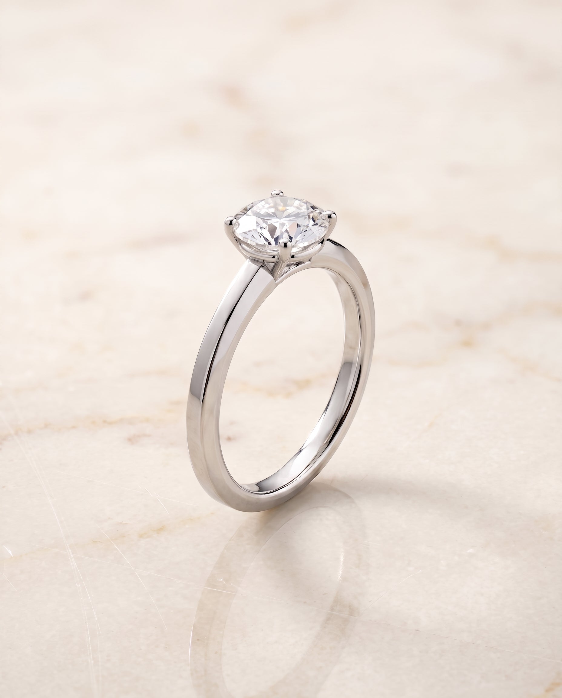The Carmen Beveled Edge Comfort Fit Solitaire Round Engagement Ring Setting in Platinum