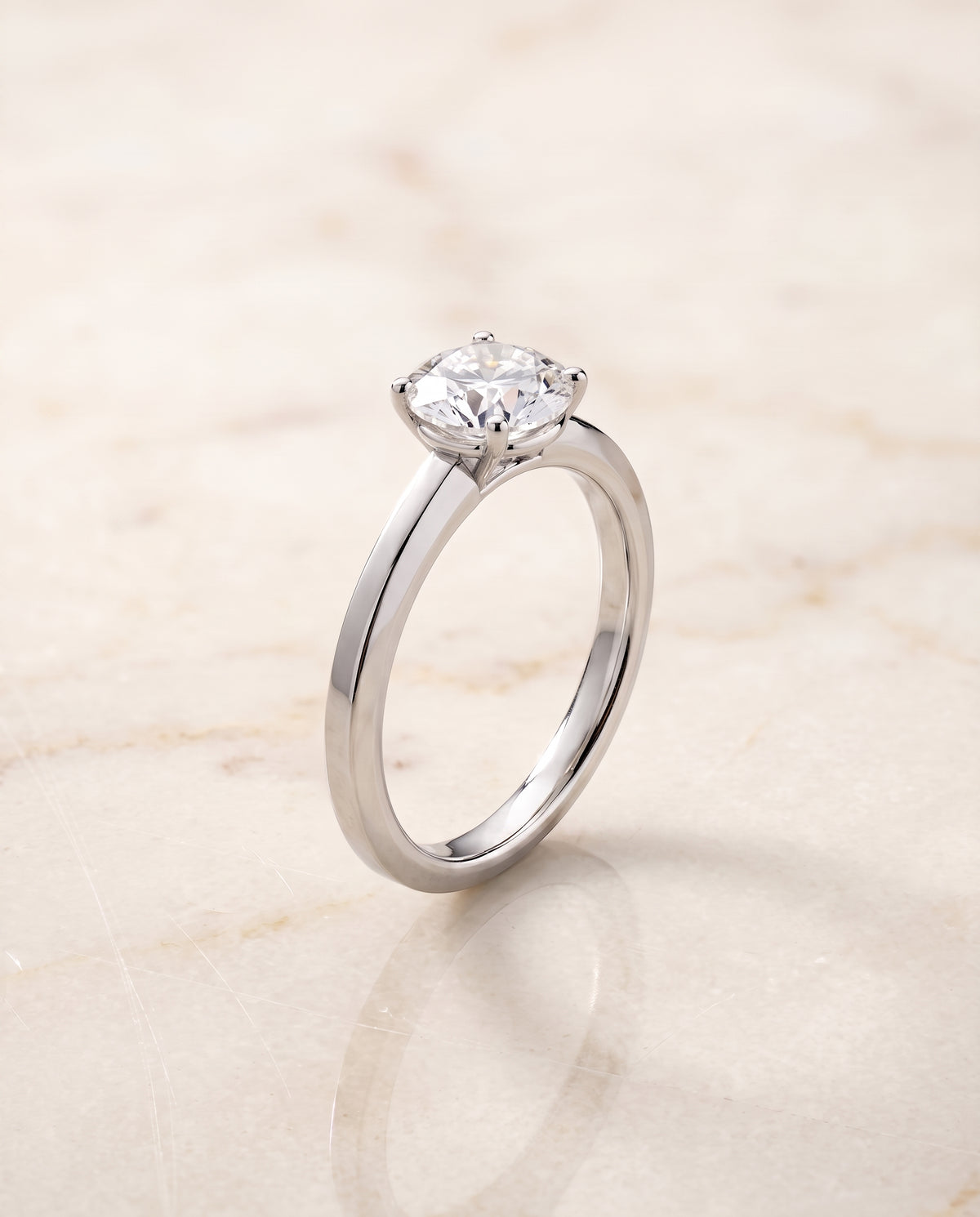 The Carmen Beveled Edge Comfort Fit Solitaire Round Engagement Ring Setting in 18K White Gold