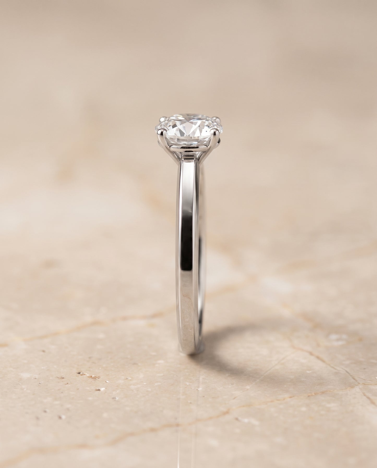 The Carmen Beveled Edge Comfort Fit Solitaire Round Engagement Ring Setting in Platinum