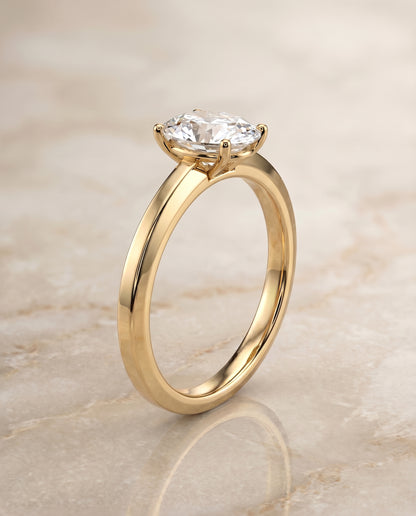 The Carmen Beveled Edge Comfort Fit Solitaire Oval Engagement Ring Setting in 18K Yellow Gold