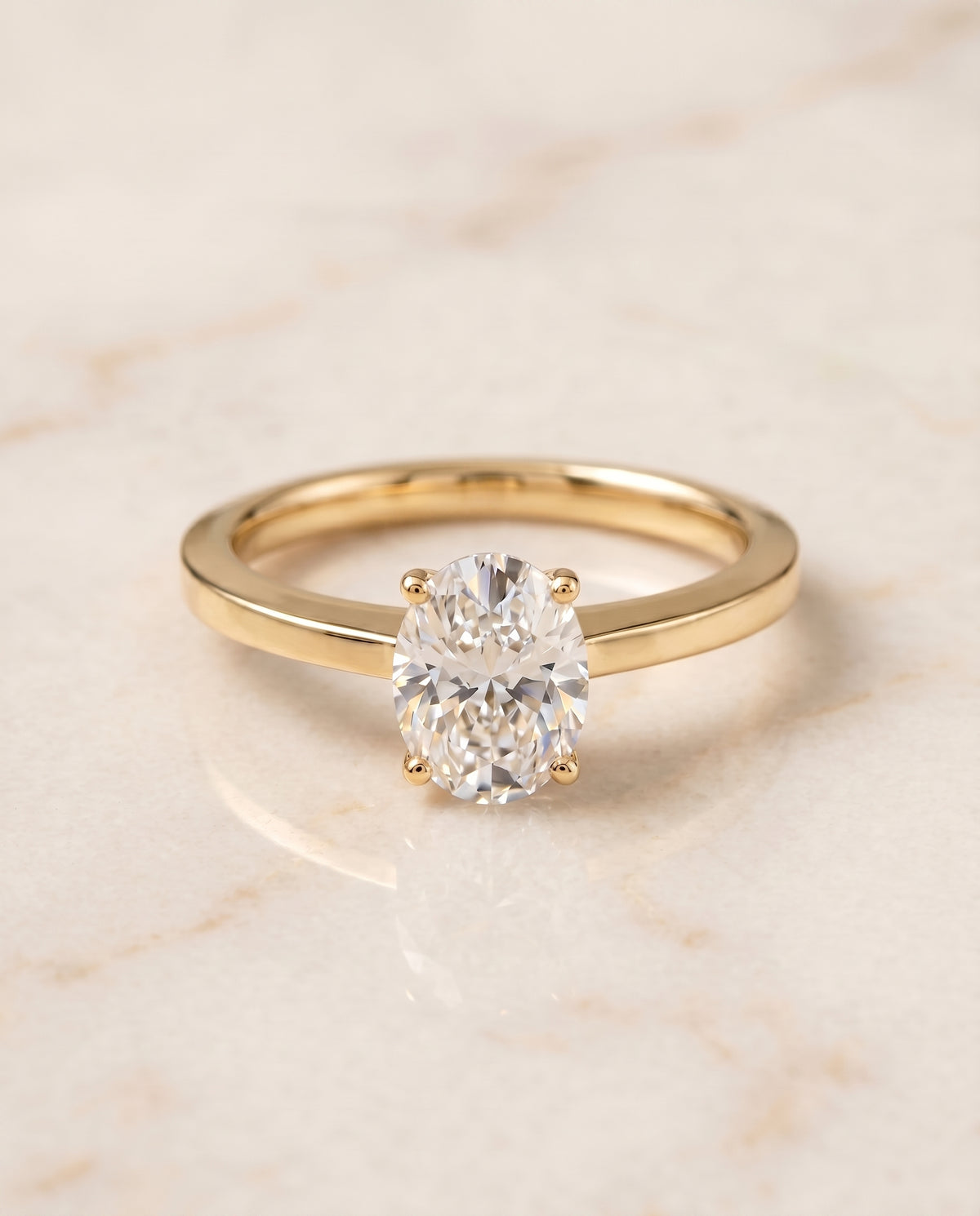 The Carmen oval engagement ring setting in 18K Yellow Gold | RockHer