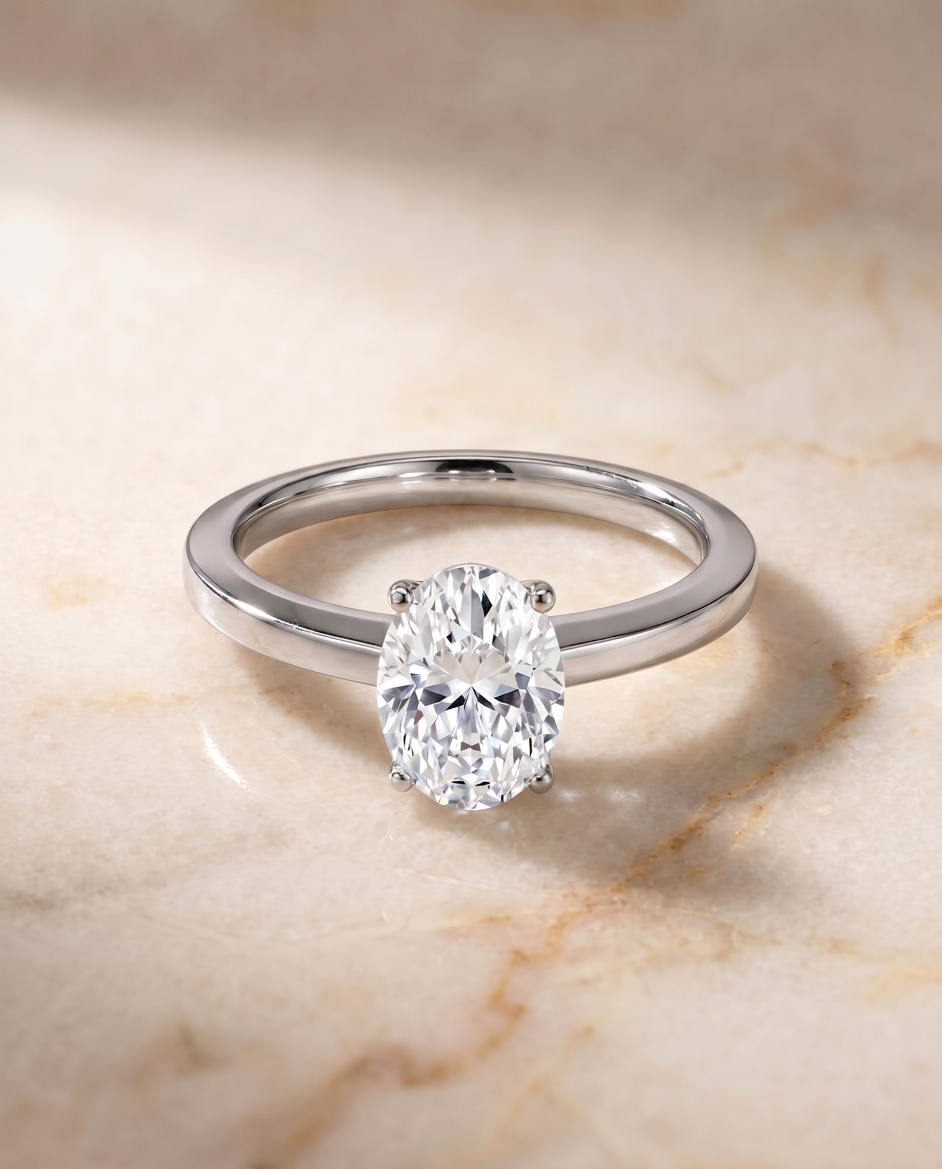 The Carmen Solitaire Engagement Ring Setting for Oval Diamonds in Platinum