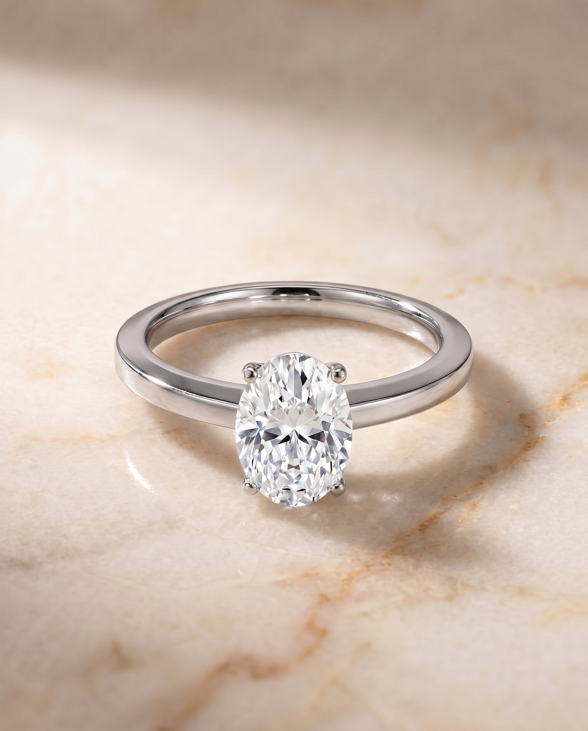 The Carmen oval engagement ring setting in Platinum | RockHer