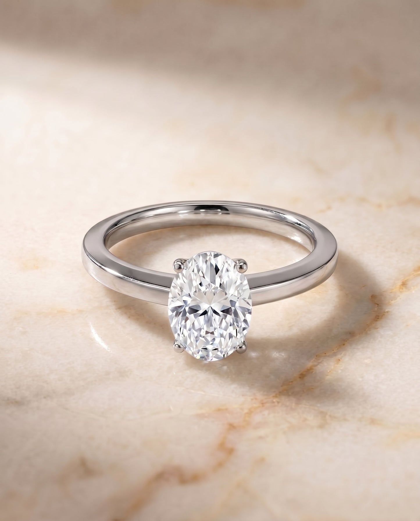 Carmen Select Solitaire Oval Lab Diamond Engagement Ring in 18K White Gold, shown on hand, angled | RockHer