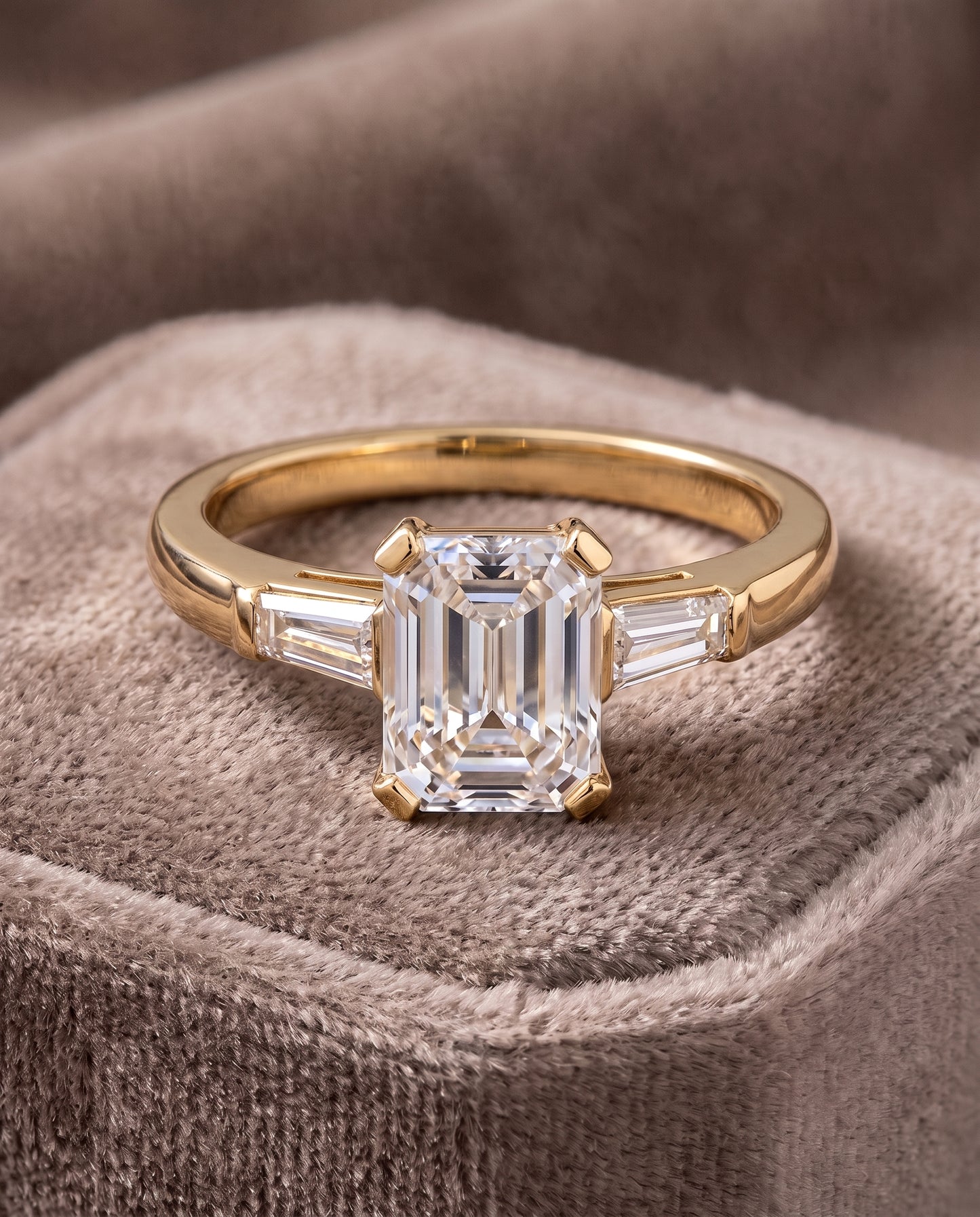 The Caroline Three Stone Emerald Cut Engagement Ring Setting in 18K Yellow Gold