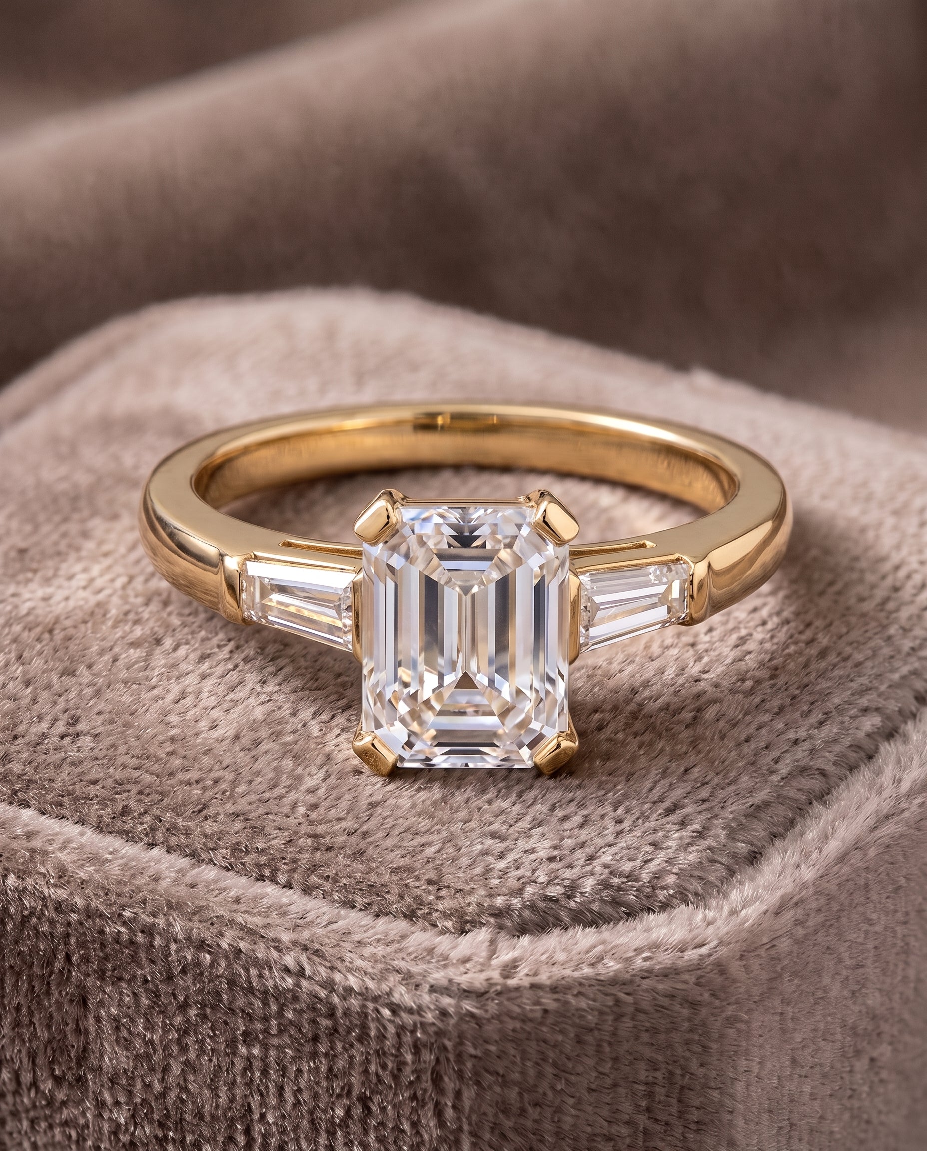 The Caroline Three Stone Emerald Cut Engagement Ring Setting in 18K Yellow Gold