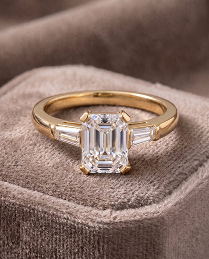 The Caroline Three Stone Emerald Cut Engagement Ring Setting in 18K Yellow Gold
