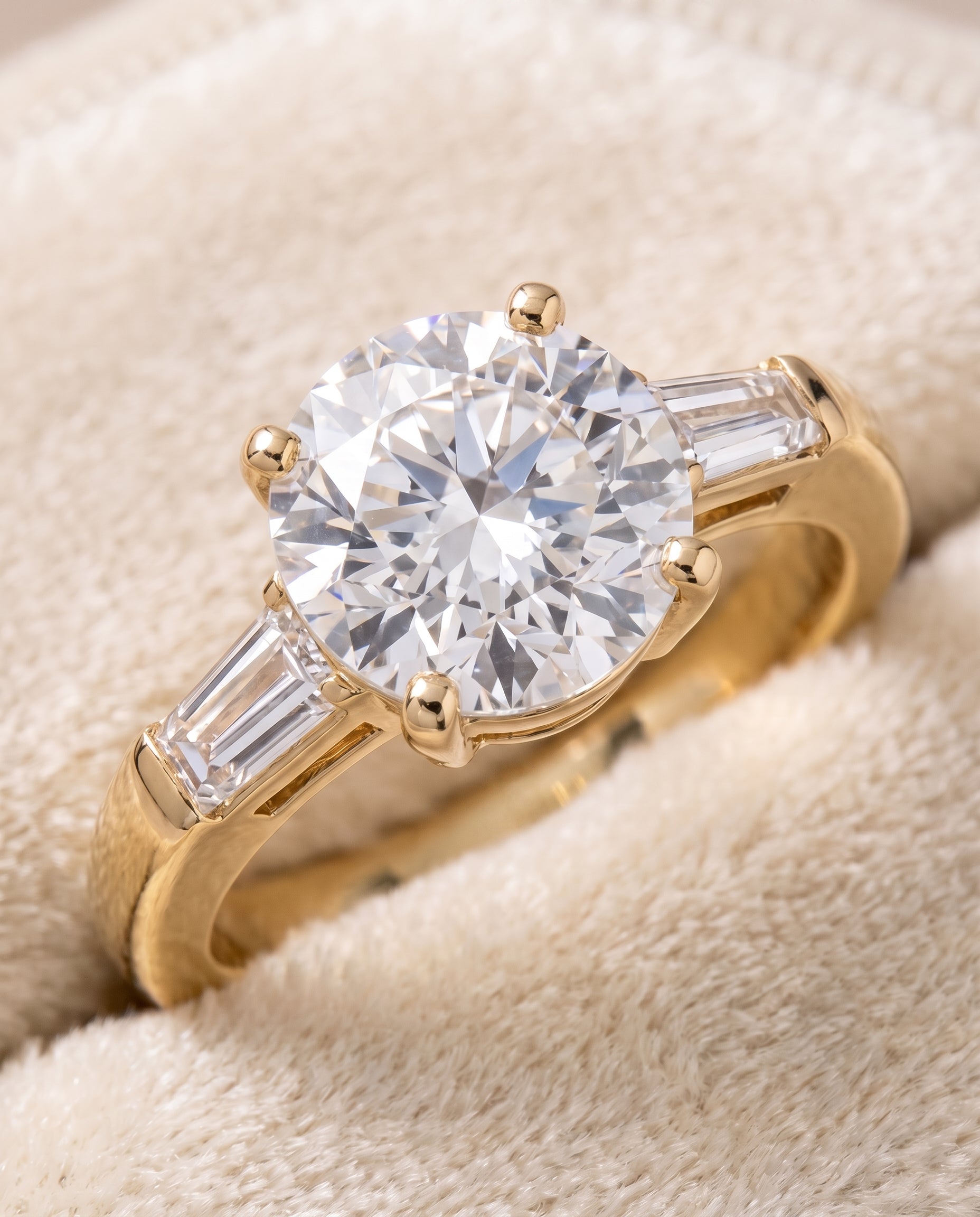 The Caroline Three Stone Round Engagement Ring Setting in 18K Yellow Gold