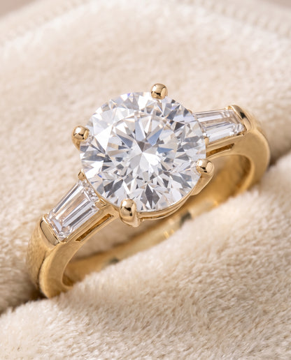 The Caroline Three Stone Round Engagement Ring Setting in 18K Yellow Gold