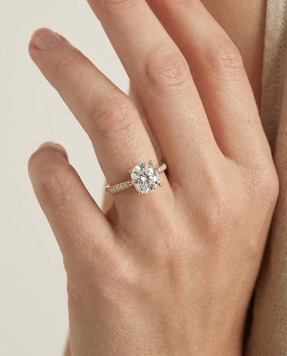 Carrie Select Pavé Cushion Cut Lab Diamond Engagement Ring in 18K Yellow Gold, shown on hand | RockHer