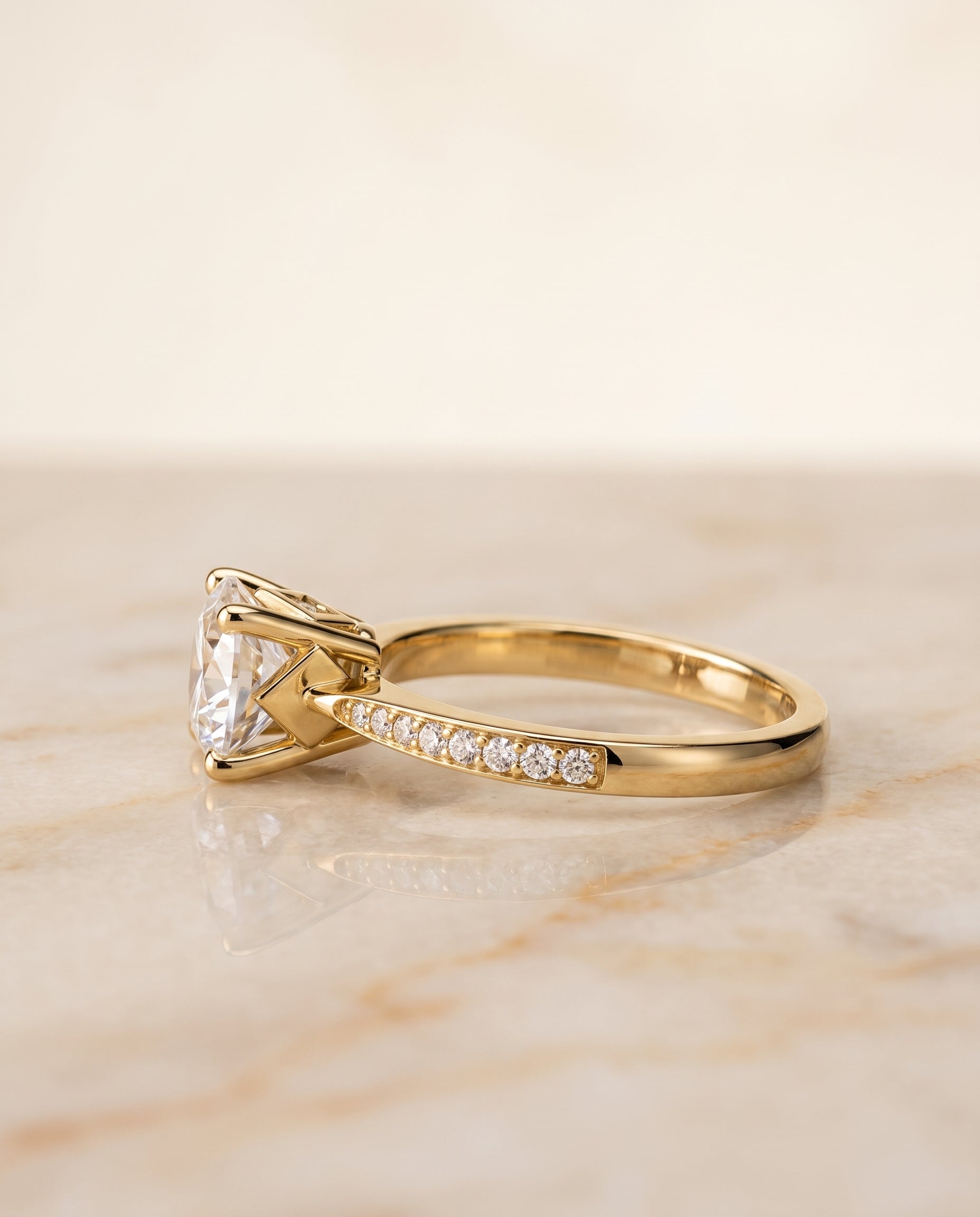 The Carrie setting for round diamonds, made to order in 18K Yellow Gold | RockHer