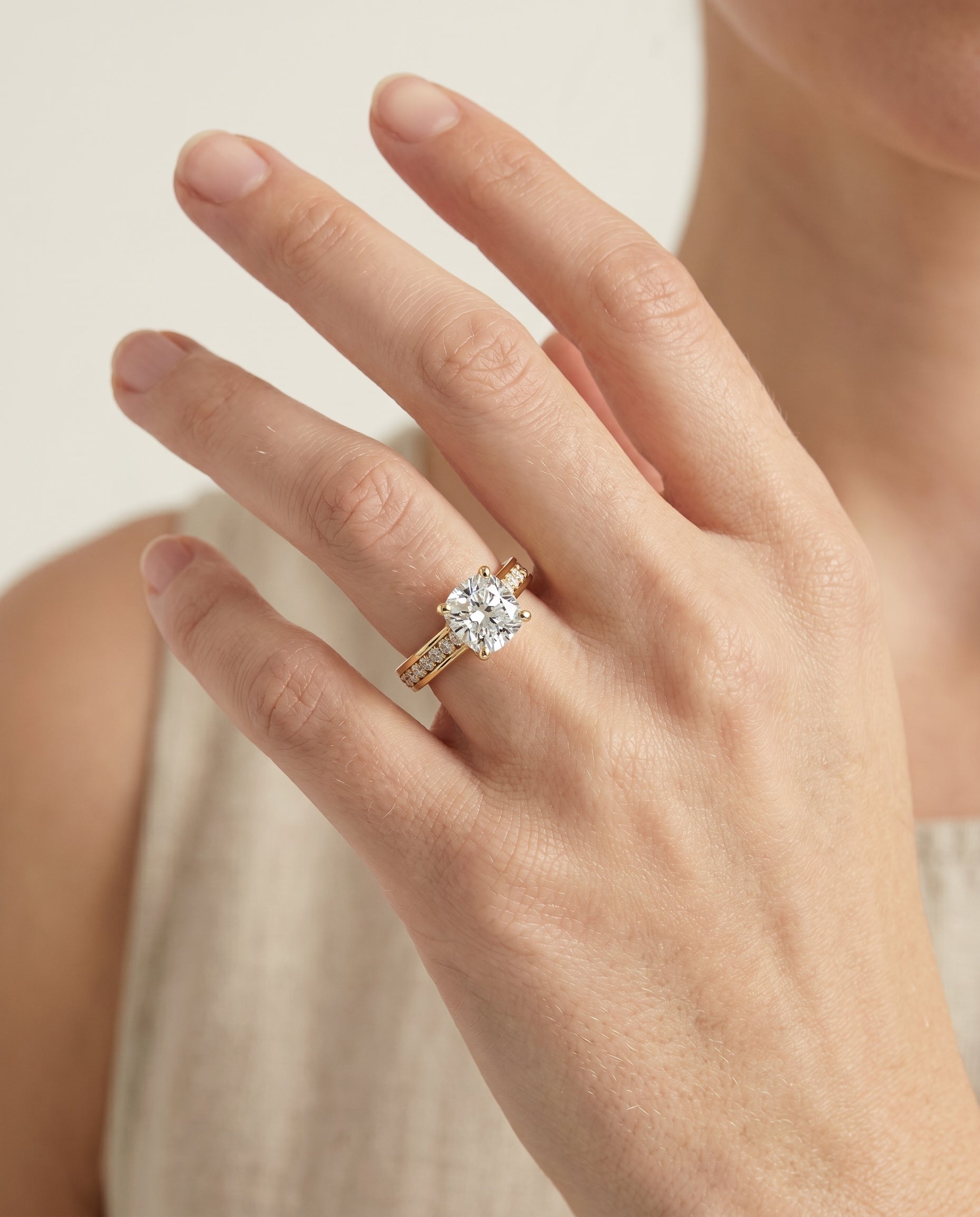 The Celesta engagement ring setting in 18K Yellow Gold, channel set pavé cut design | RockHer