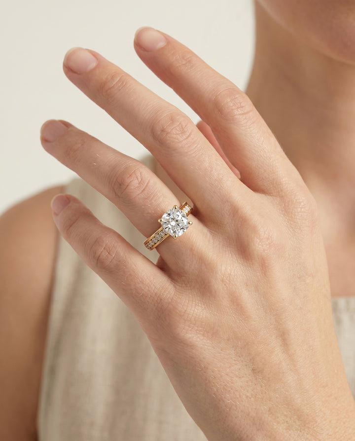 The Celesta Channel Set Pavé Cushion Cut Engagement Ring Setting in 18K Yellow Gold