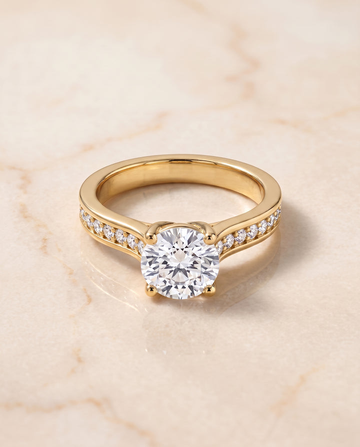 The Celesta Channel Set Pavé Round Engagement Ring Setting in 18K Yellow Gold