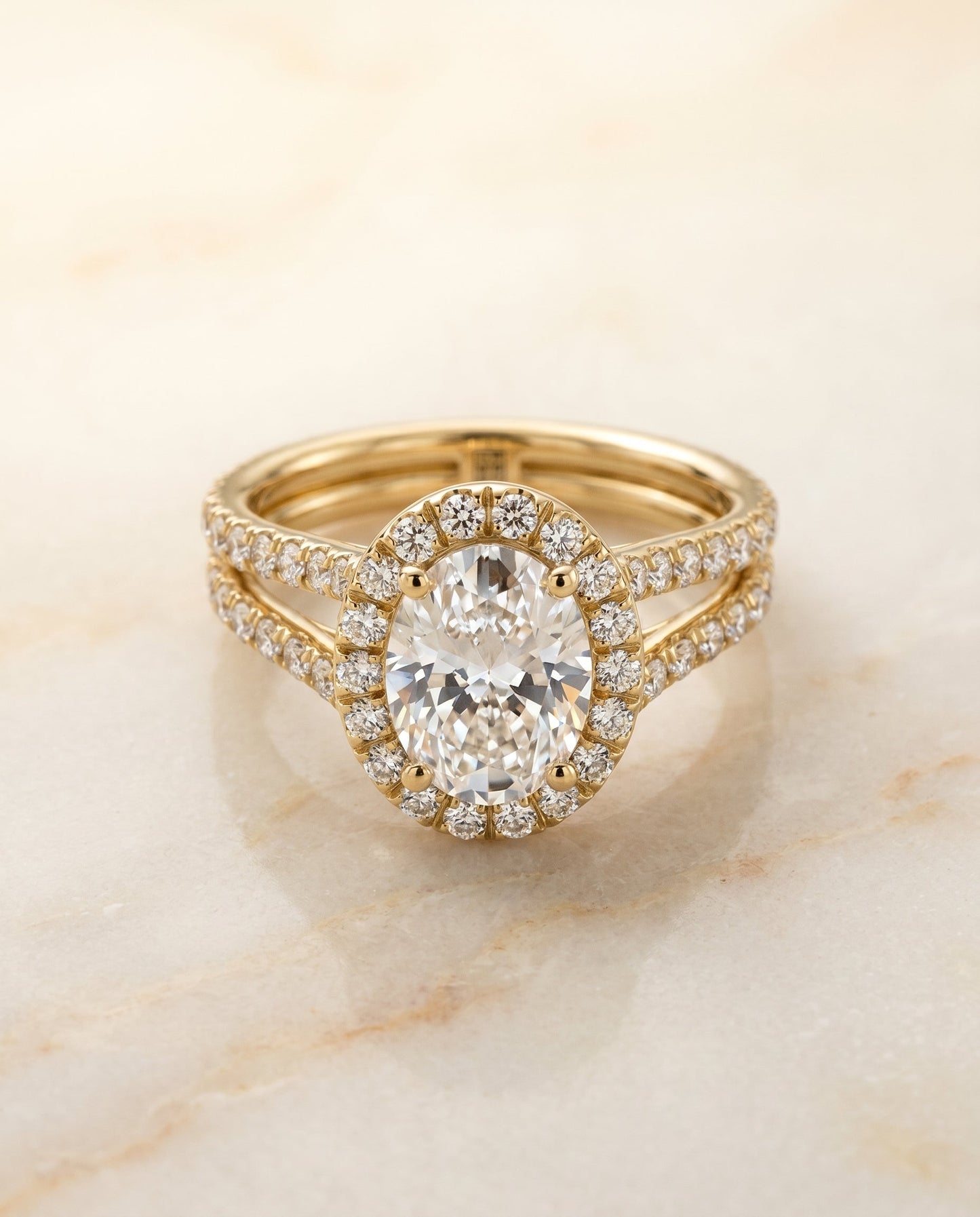 Celine Select Halo Oval Lab Diamond Engagement Ring in 18K Yellow Gold, shown on hand, angled | RockHer