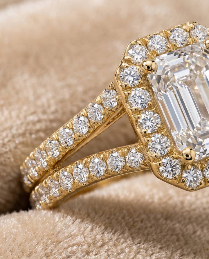 The Celine Two Row Pavé Split Shank Halo Emerald Cut Engagement Ring Setting in 18K Yellow Gold