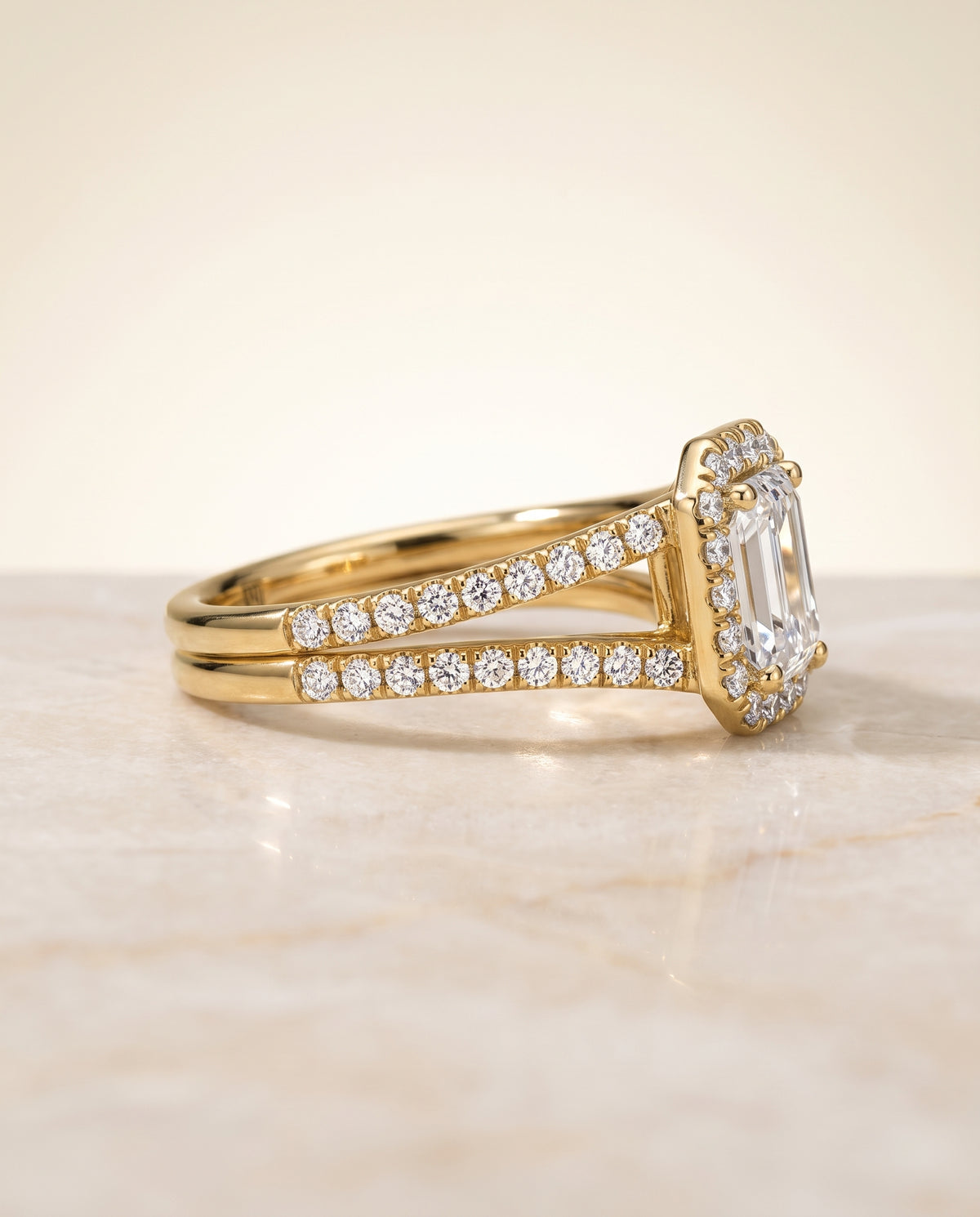 The Celine Two Row Pavé Split Shank Halo Emerald Cut Engagement Ring Setting in 18K Yellow Gold
