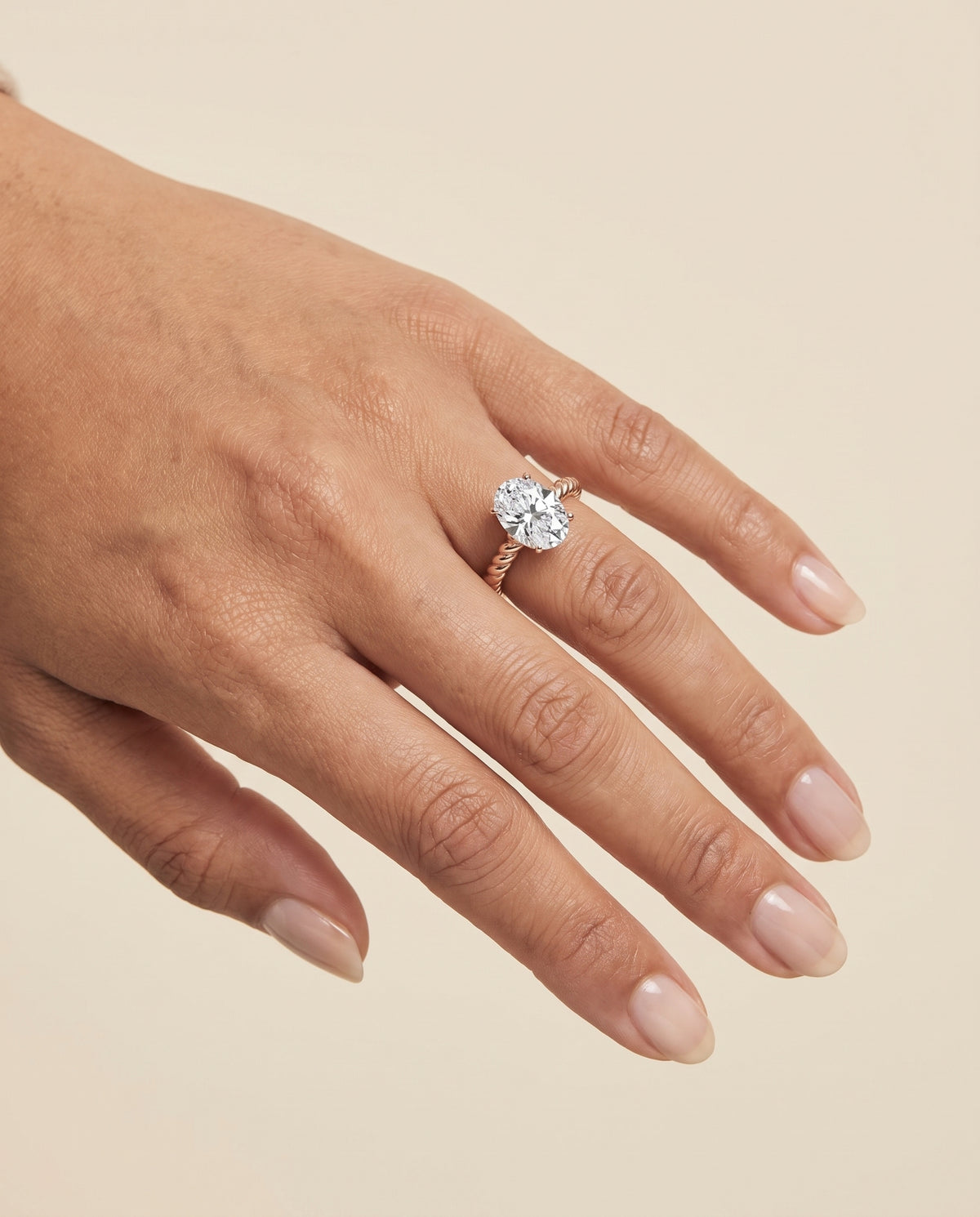 The Charlie Twisted Rope Surprise Stone Solitaire Oval Engagement Ring Setting in 14K Rose Gold