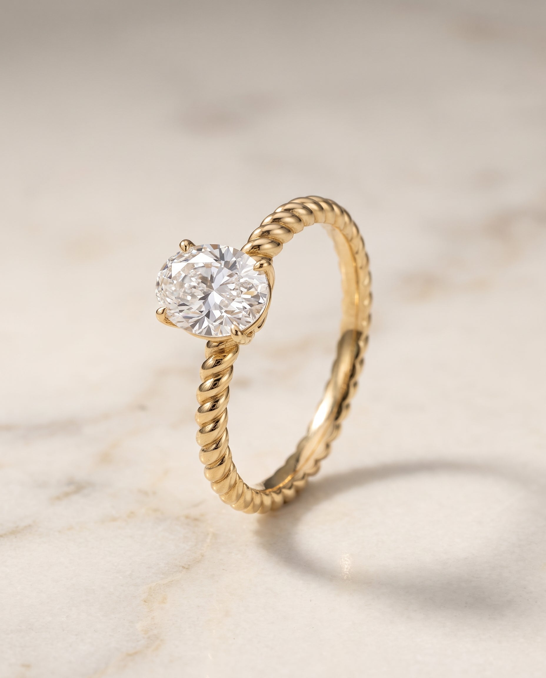 Twisted Rope Surprise Diamond Solitaire styling on The Charlie oval engagement ring setting | RockHer