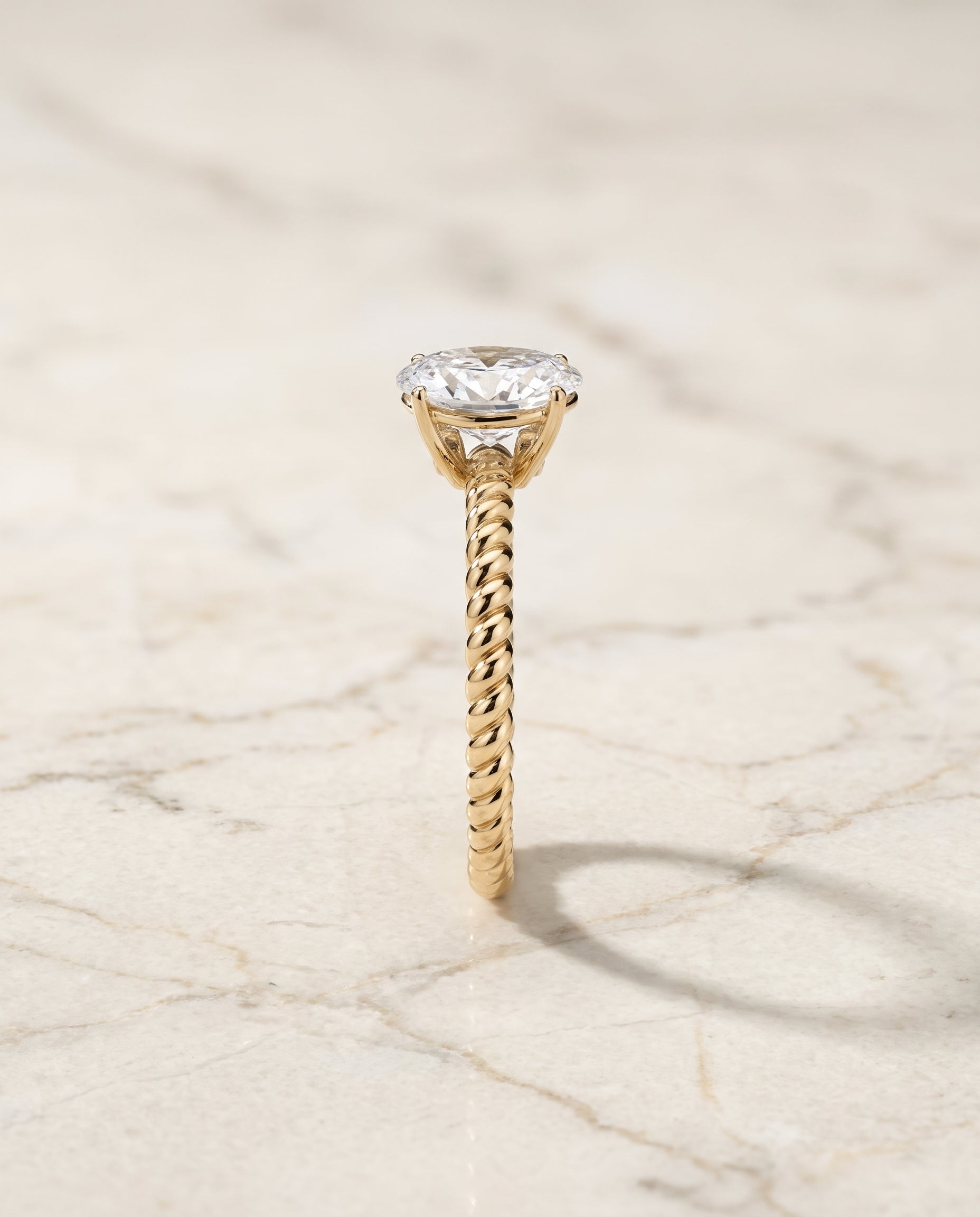 The Charlie setting for oval diamonds, made to order in 18K Yellow Gold | RockHer