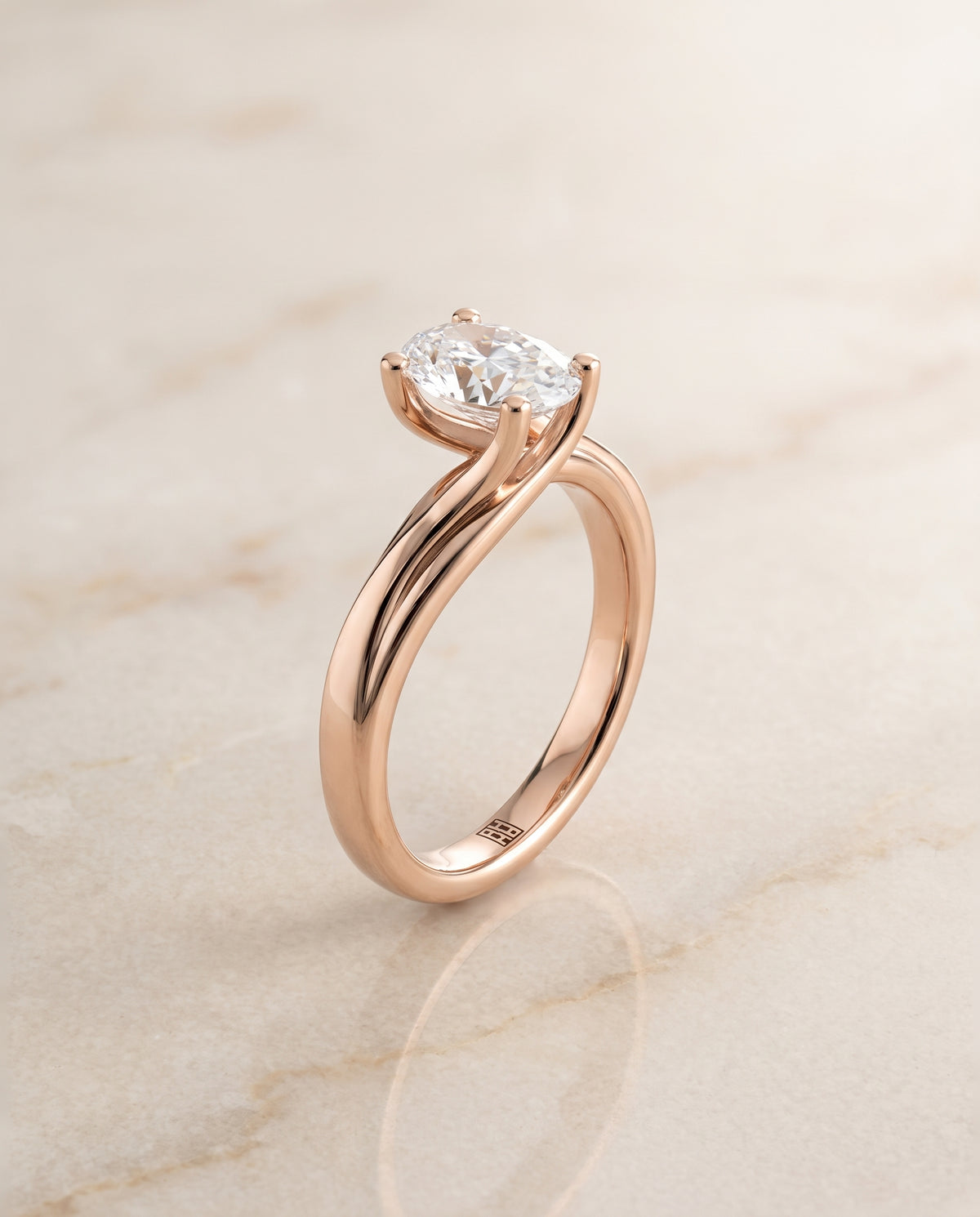 The Joplin Twisted Bypass Solitaire Oval Engagement Ring Setting in 14K Rose Gold