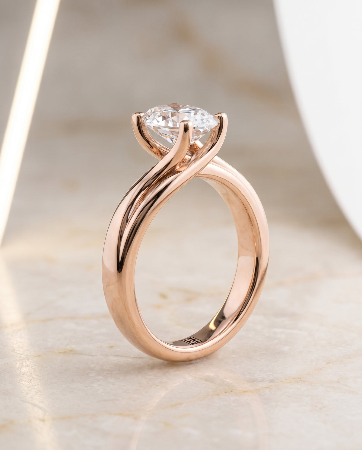 The Joplin Twisted Bypass Solitaire Oval Engagement Ring Setting in 14K Rose Gold