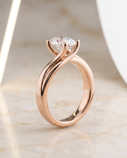 The Joplin Twisted Bypass Solitaire Oval Engagement Ring Setting in 14K Rose Gold