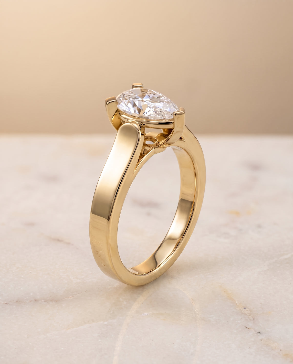 The Charlotte pear engagement ring setting in 18K Yellow Gold | RockHer