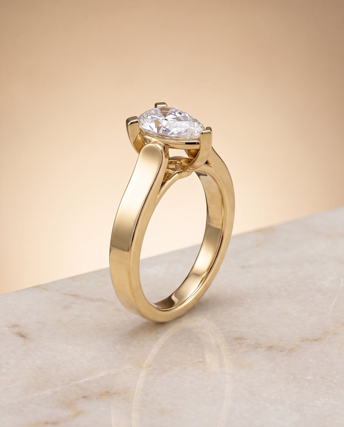 The Charlotte setting for pear diamonds, made to order in 18K Yellow Gold | RockHer