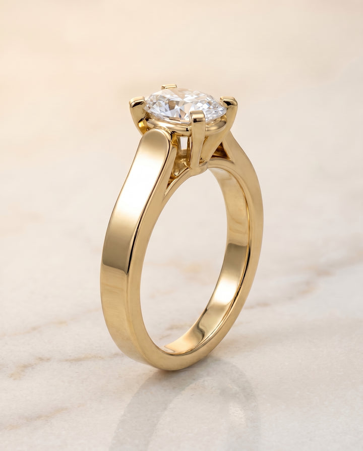 The Charlotte Solitaire Engagement Ring Setting for Oval Diamonds in 18K Yellow Gold