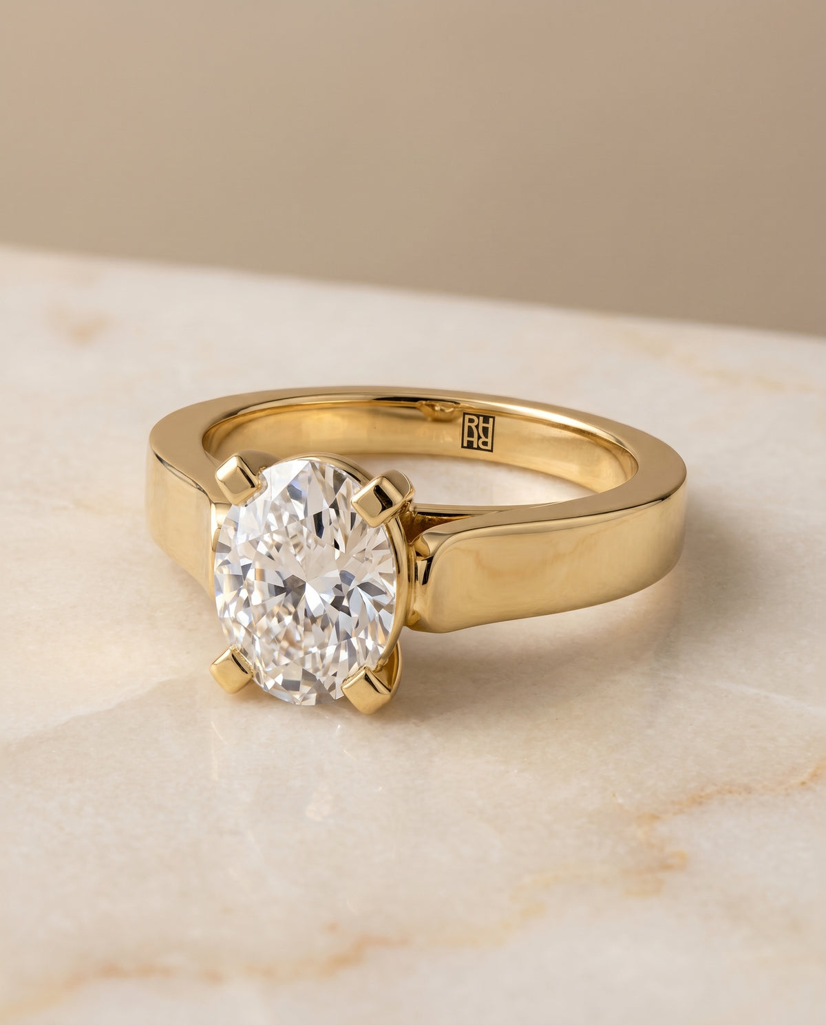 The Charlotte setting for oval diamonds, made to order in 18K Yellow Gold | RockHer