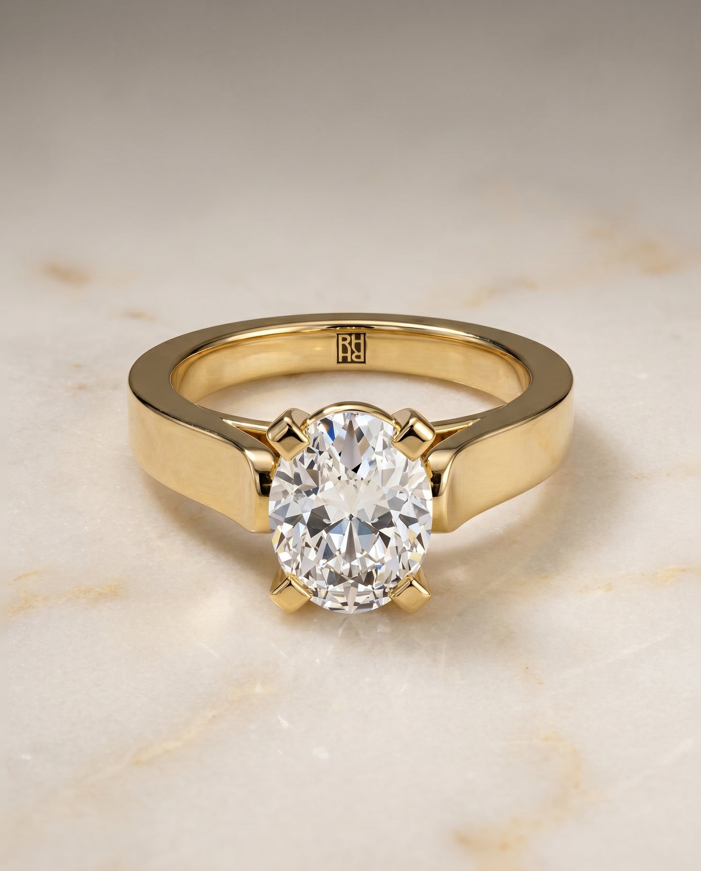 The Charlotte Solitaire Engagement Ring Setting for Oval Diamonds in 18K Yellow Gold
