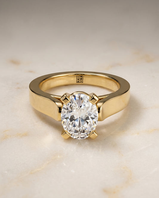 The Charlotte Solitaire Engagement Ring Setting for Oval Diamonds in 18K Yellow Gold