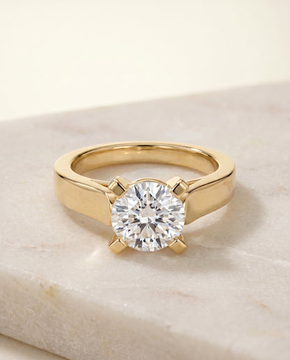 Charlotte Select Cathedral Solitaire Round Lab Diamond Engagement Ring in 18K Yellow Gold, shown on hand, angled | RockHer