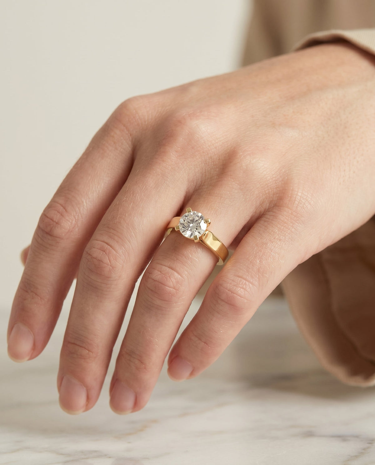 Charlotte Select Cathedral Solitaire Round Lab Diamond Engagement Ring in 18K Yellow Gold, shown on hand | RockHer