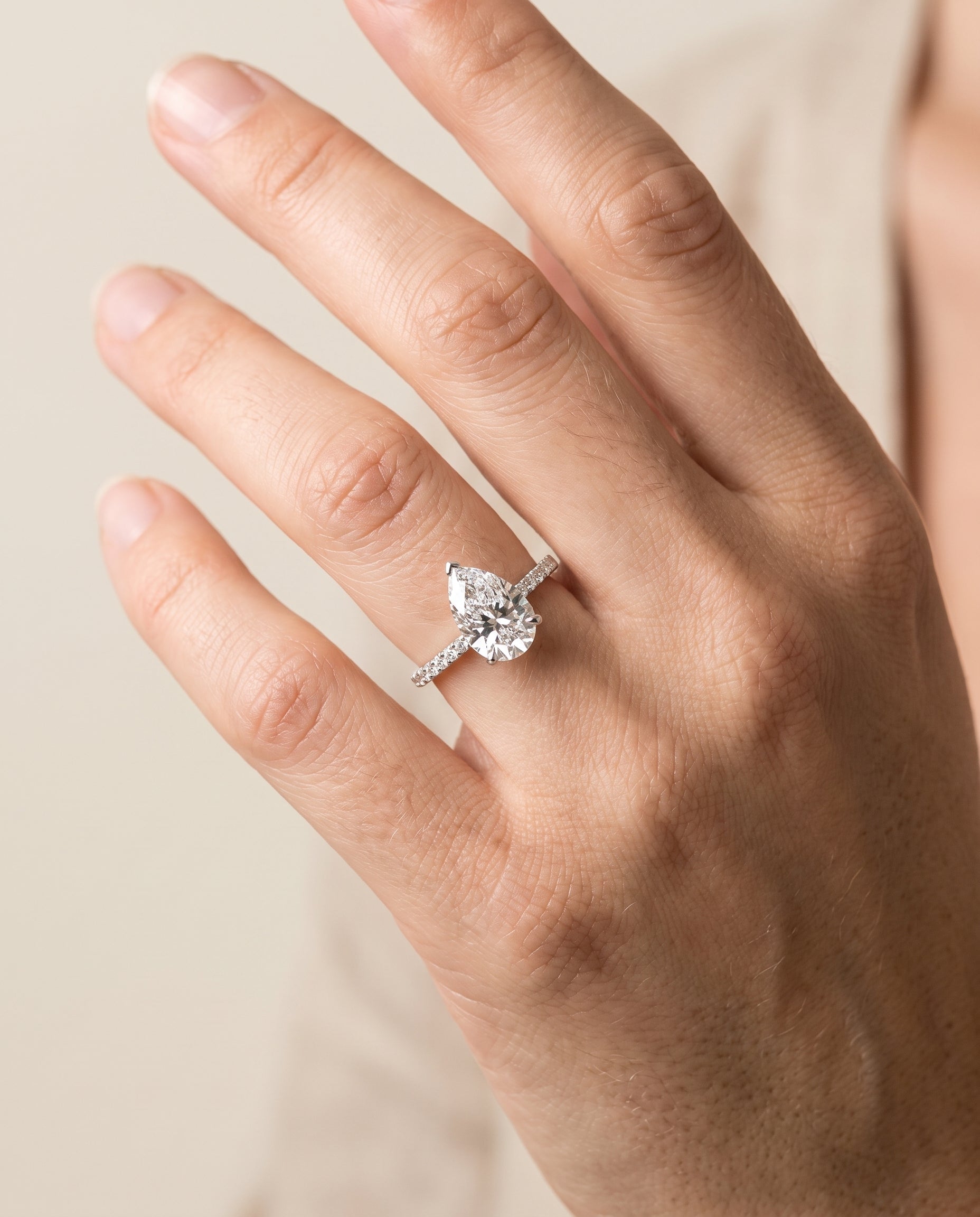 The Cherie engagement ring setting in 18K White Gold, hidden halo pavé solitaire design | RockHer