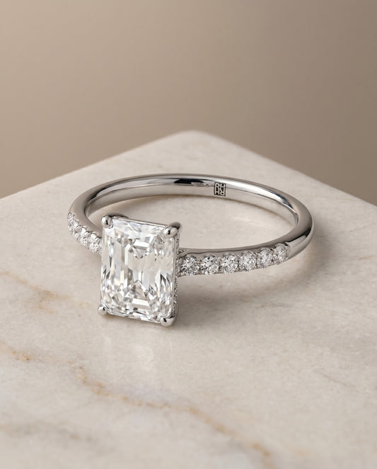 The Cherie Hidden Halo Solitaire Engagement Ring Setting for Emerald Cut Diamonds in Platinum