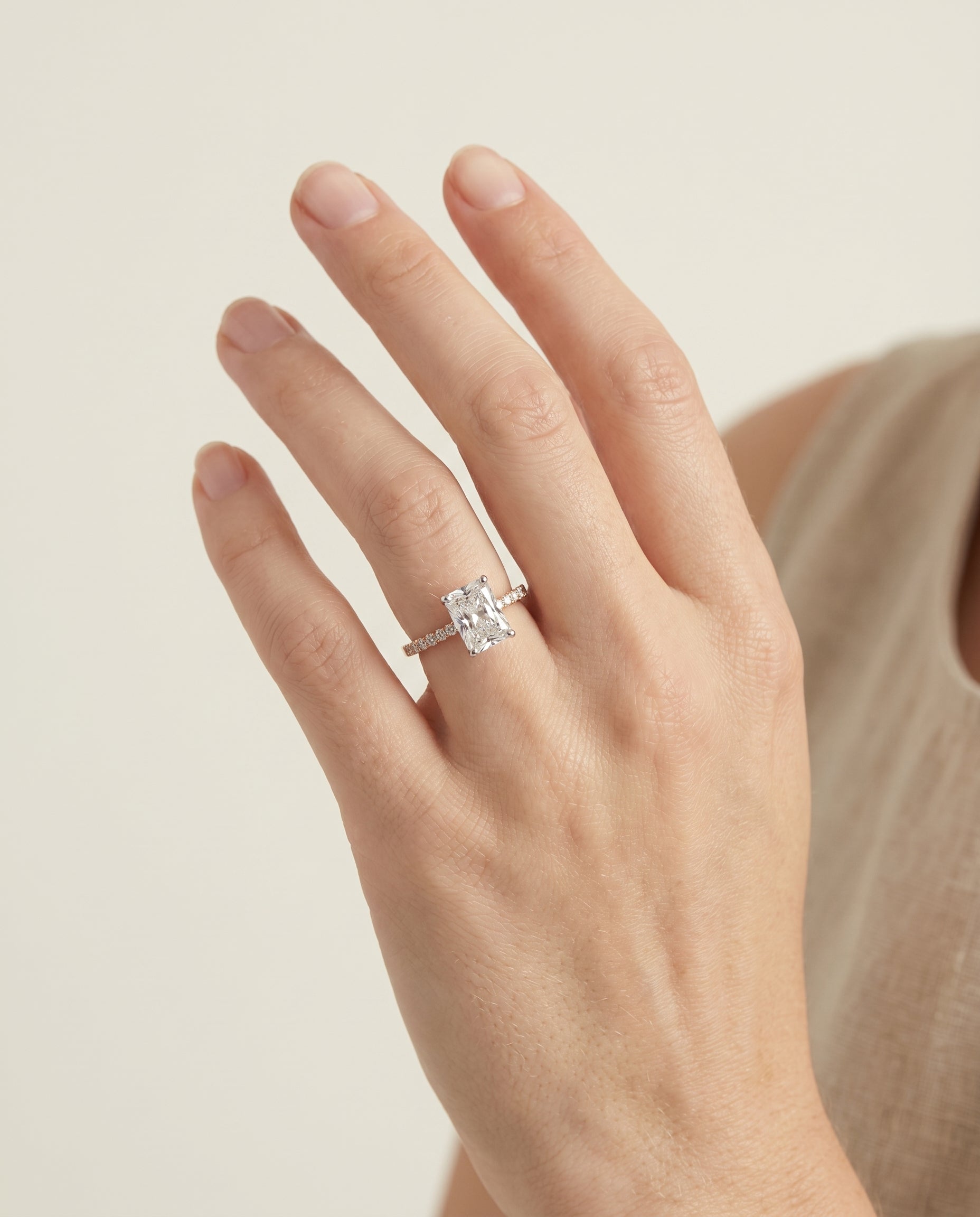 The Cherie engagement ring setting in 14K Rose Gold, hidden halo pavé solitaire cut design | RockHer