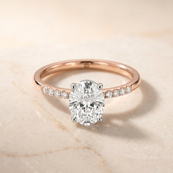 The Cherie Hidden Halo Pavé Solitaire Oval Engagement Ring Setting in 14K Rose Gold