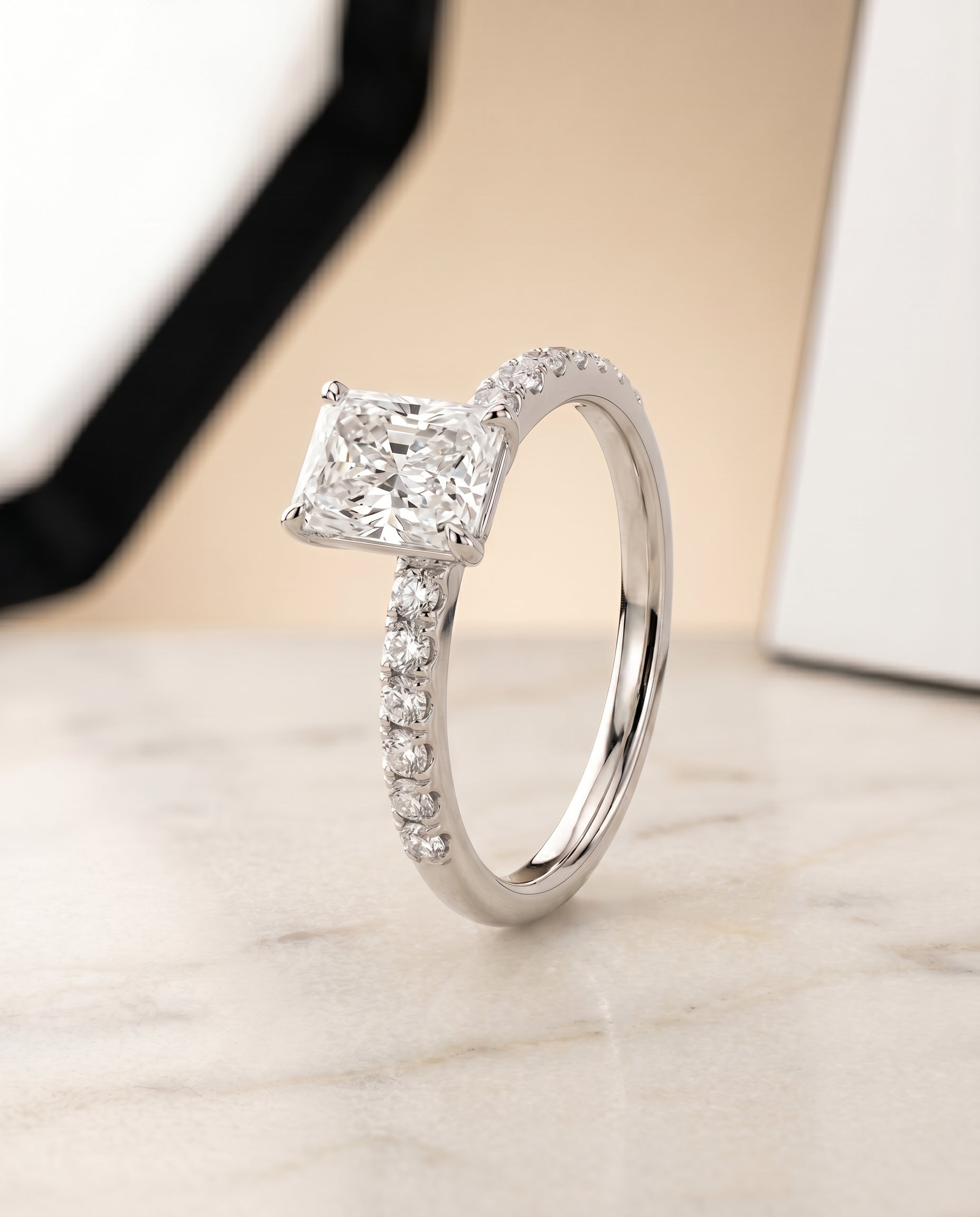 Hidden Halo Pavé Solitaire Cut styling on The Cherie radiant engagement ring setting | RockHer